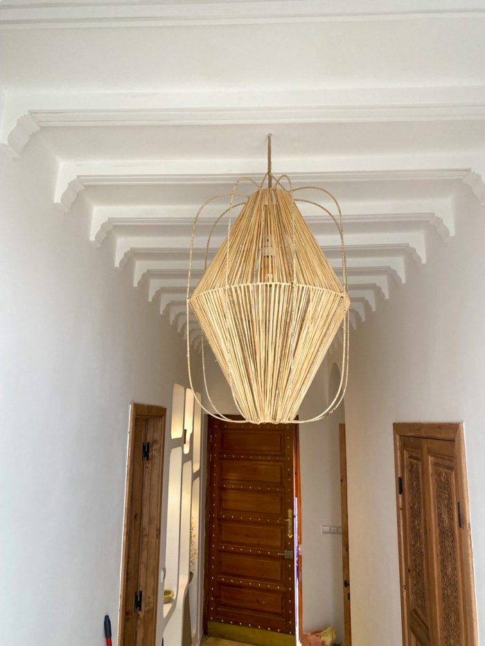 Diamond raffia pendant light with sculptural handwoven cage design