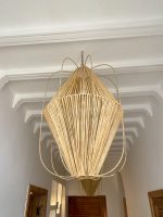 Diamond raffia pendant light with sculptural handwoven cage design