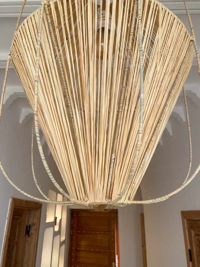 Diamond raffia pendant light with sculptural handwoven cage design