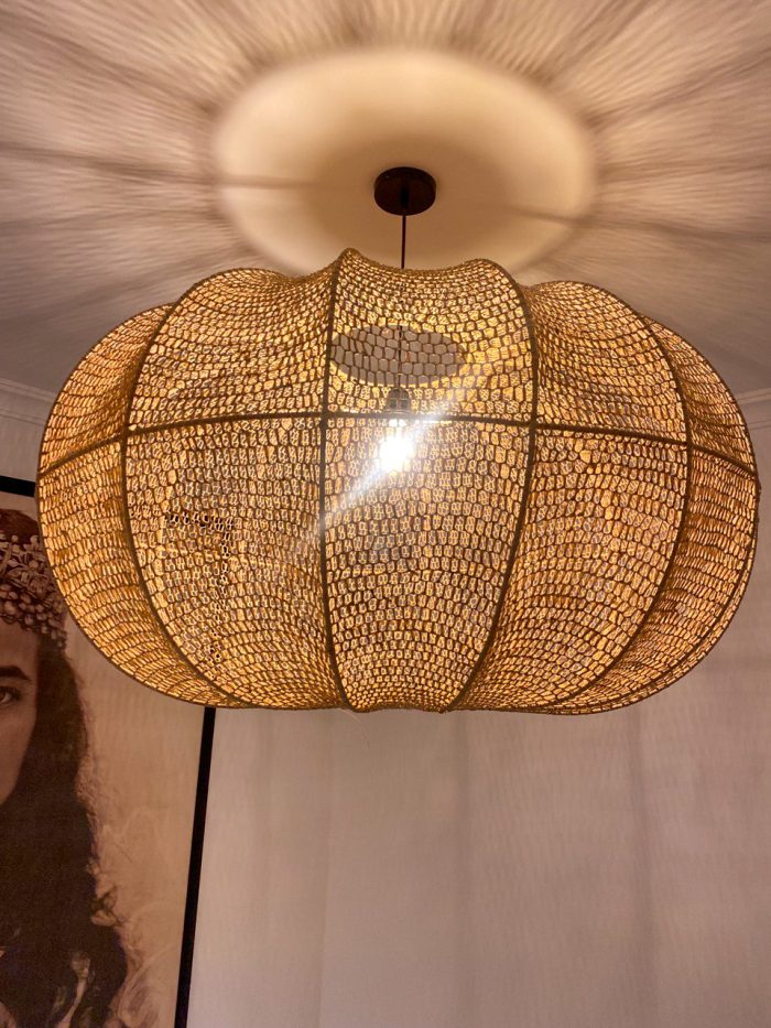 Handmade wavy raffia pendant light with ribbed pumpkin shape