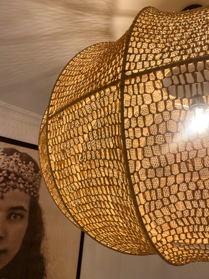 Handmade wavy raffia pendant light with ribbed pumpkin shape