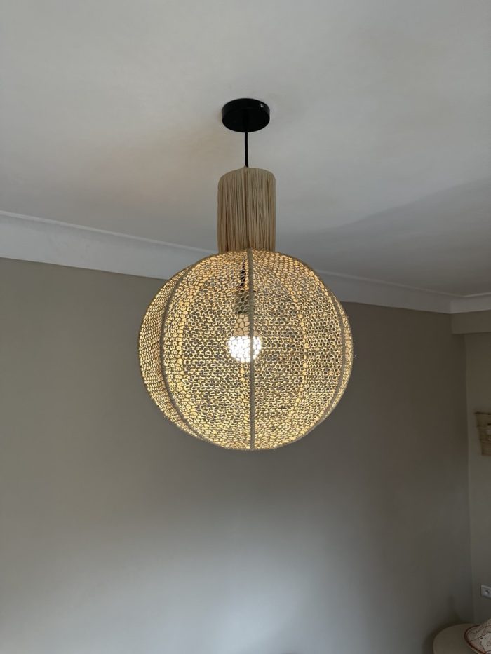 Round raffia pendant light handmade in Morocco with woven globe shape