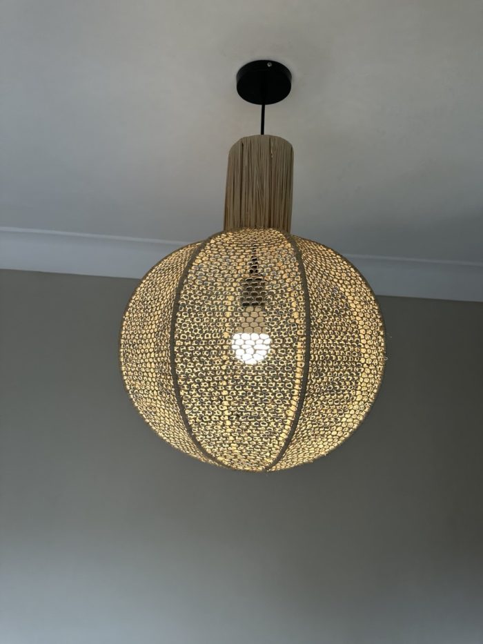 Round raffia pendant light handmade in Morocco with woven globe shape