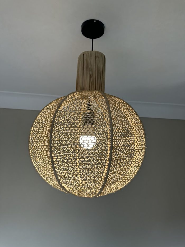 Round raffia pendant light handmade in Morocco with woven globe shape