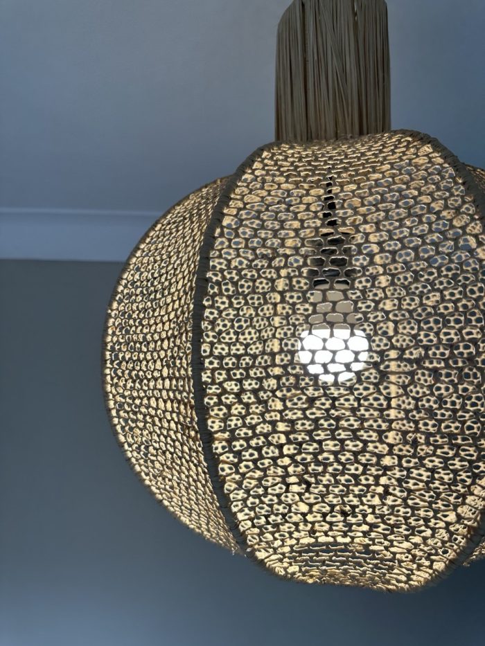 Round raffia pendant light handmade in Morocco with woven globe shape