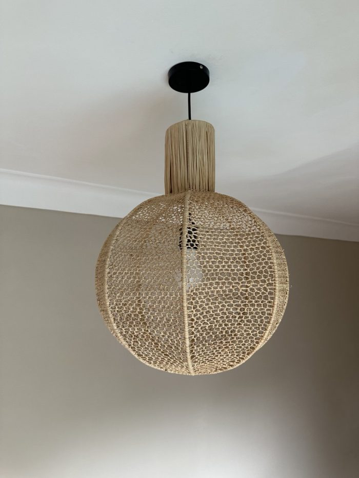 Round raffia pendant light handmade in Morocco with woven globe shape