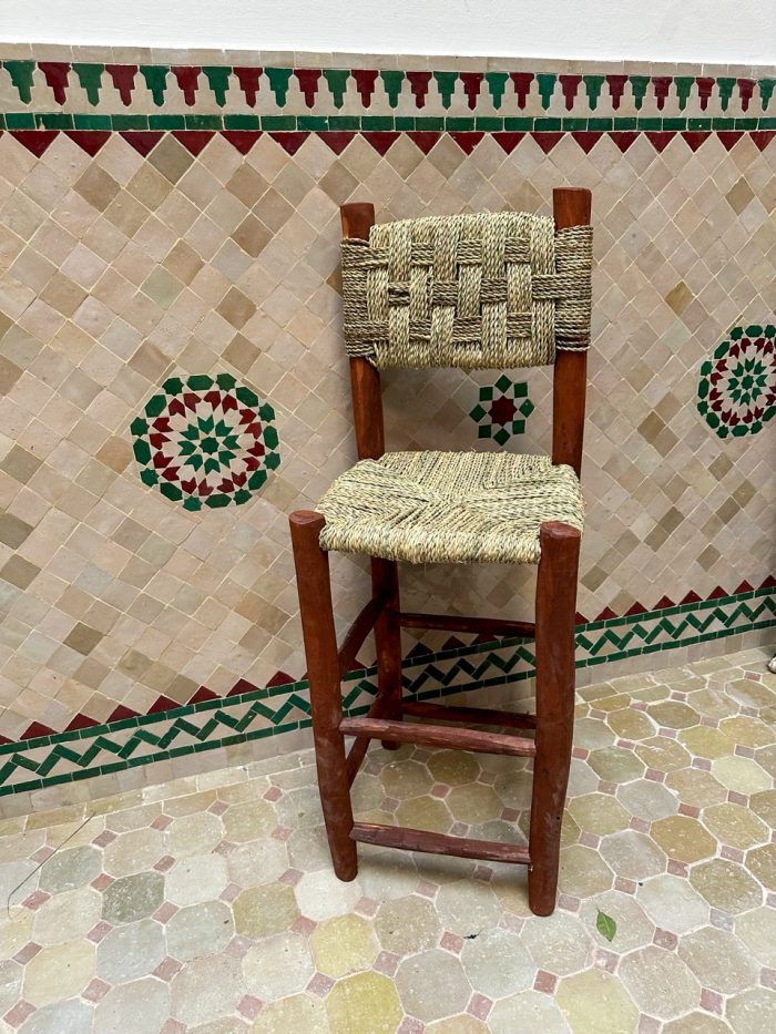 Handwoven Palm Leaf Bar Stool handcrafted from solid wood with a natural woven palm leaf seat