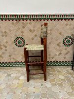 Handwoven Palm Leaf Bar Stool handcrafted from solid wood with a natural woven palm leaf seat