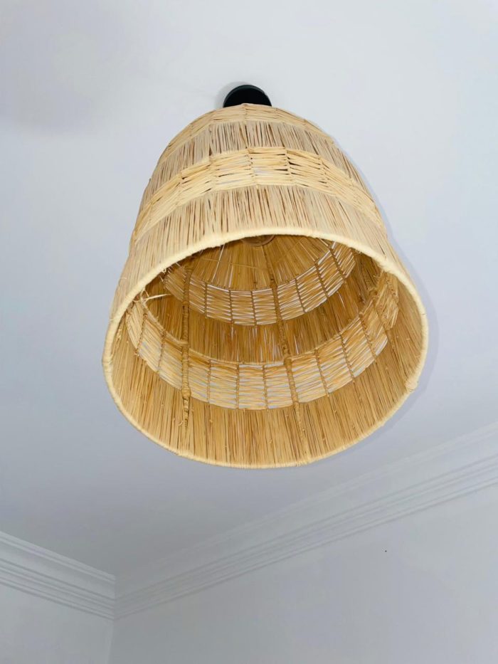 Tiered raffia pendant light with handwoven bell shaped shade