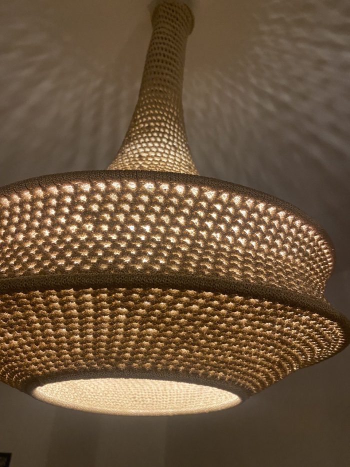Handmade rope pendant light with long neck and tiered circular shape