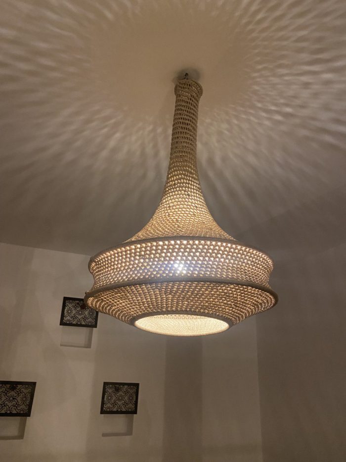 Handmade rope pendant light with long neck and tiered circular shape