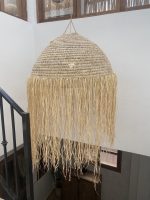 Moroccan straw ball pendant light with long natural raffia fringe