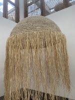 Moroccan straw ball pendant light with long natural raffia fringe