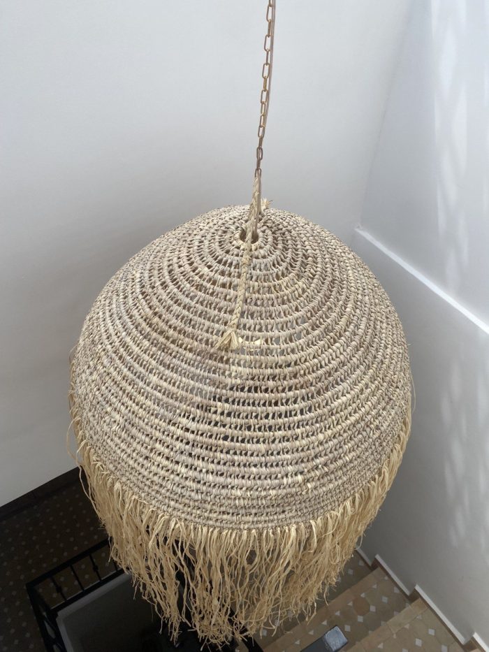 Moroccan straw ball pendant light with long natural raffia fringe