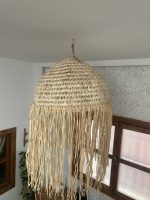 Moroccan straw ball pendant light with long natural raffia fringe