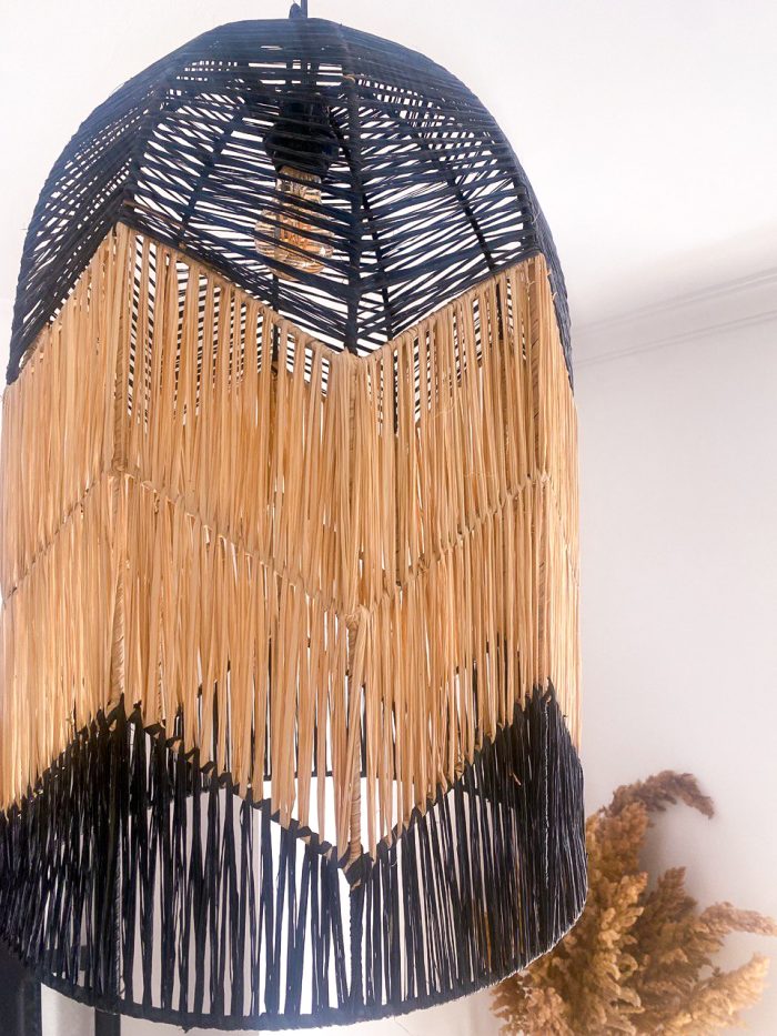 Black and natural bell raffia pendant light with geometric woven design