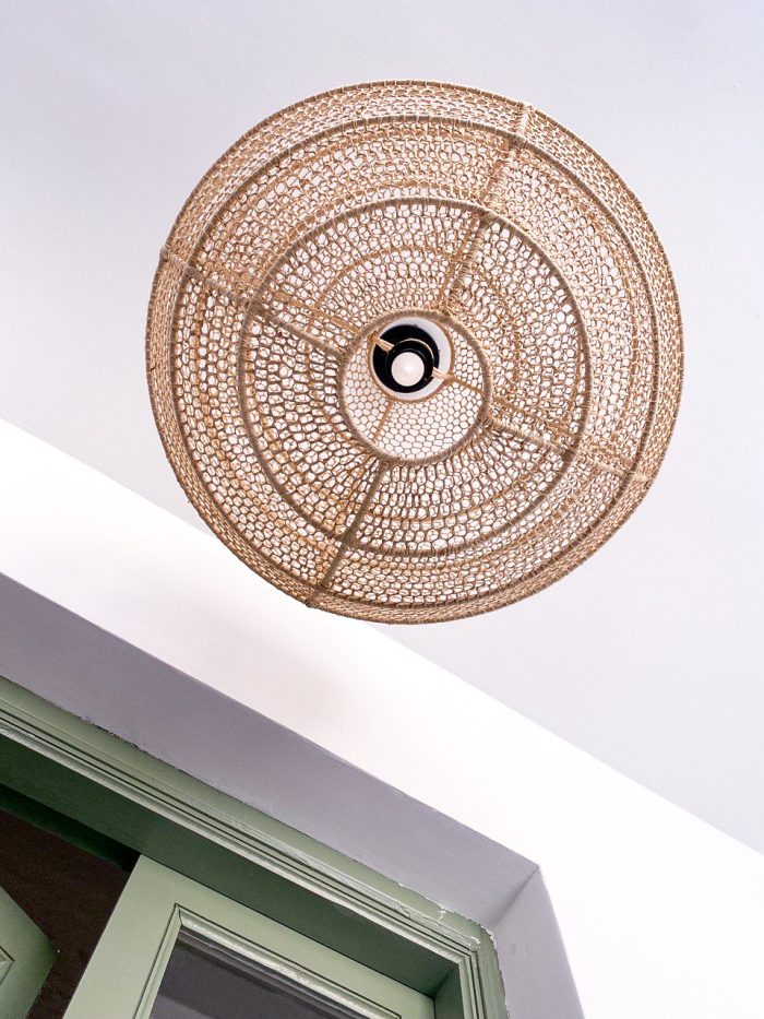 Handmade round raffia pendant light with woven globe basket shape
