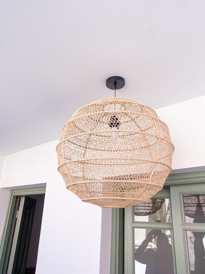 Handmade round raffia pendant light with woven globe basket shape