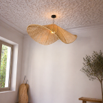 Handmade wavy raffia pendant light with sculptural woven dome shape