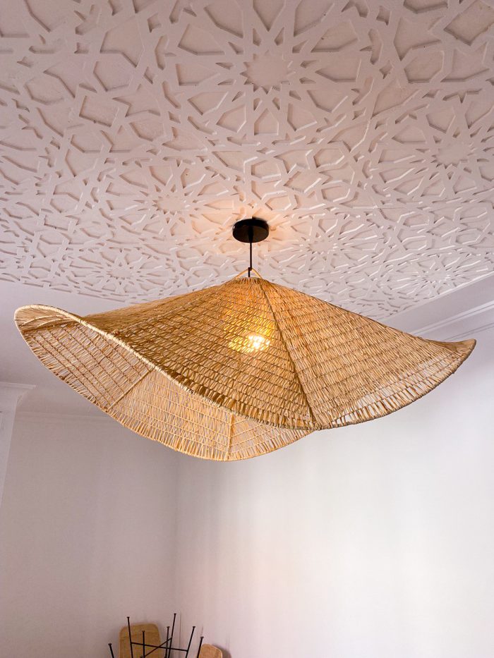 Handmade wavy raffia pendant light with sculptural woven dome shape