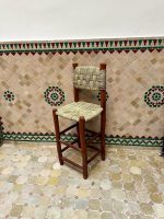 Handwoven Palm Leaf Bar Stool handcrafted from solid wood with a natural woven palm leaf seat