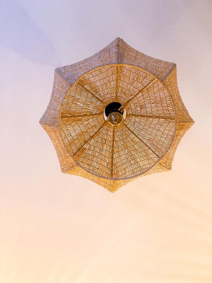 Handwoven Raffia Pendant Light – Round Artisan Lamp - Image 3