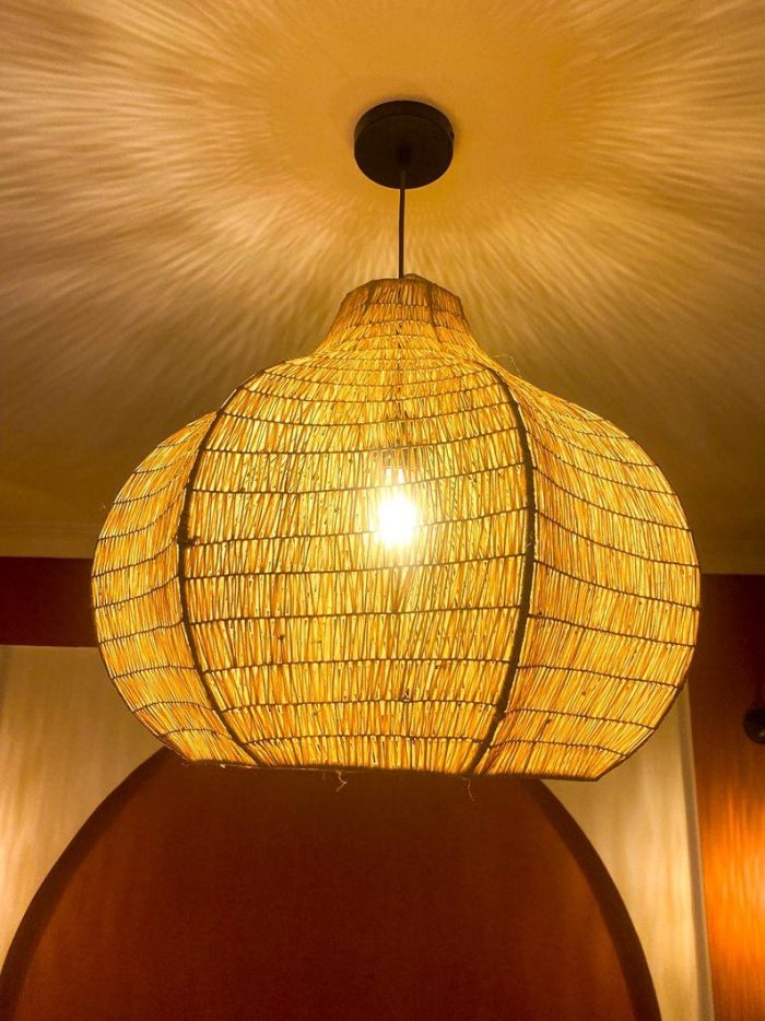 Handwoven Raffia Pendant Light – Round Artisan Lamp - Image 4