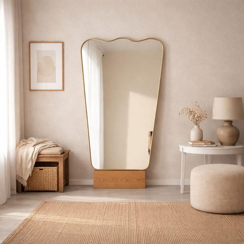 il_794xN.7566926697_cgfw Antique Brass Curved Wall Mirror - Handcrafted Design - Image 1