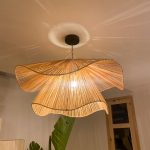 Handmade wavy flower raffia pendant light with layered natural woven petals