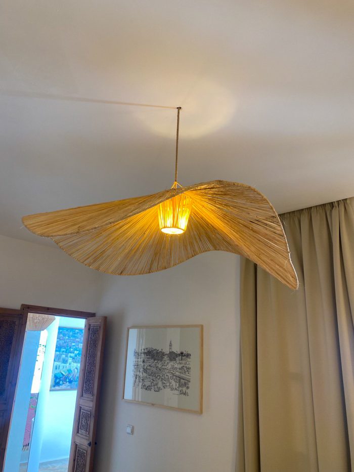 Wave raffia pendant light handmade in Morocco with sculptural woven shade