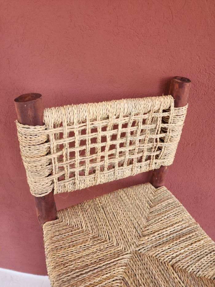 Palm Leaf Counter Stool handcrafted from solid wood with a natural handwoven palm leaf seat