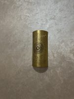 Handmade radiant rosette brass wall sconce with central geometric floral medallion and pierced decorative pattern.