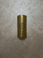Handmade radiant rosette brass wall sconce with central geometric floral medallion and pierced decorative pattern.