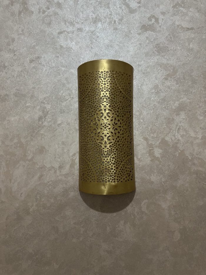Handmade diamond medallion brass wall sconce with intricate perforated pattern and warm decorative up-and-down lighting.