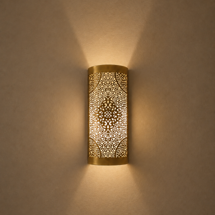 Handmade diamond medallion brass wall sconce with intricate perforated pattern and warm decorative up-and-down lighting.