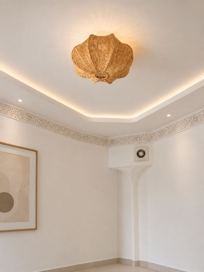 Sculptural petal raffia ceiling light with handwoven natural fibers, metal frame and organic flower-shaped flush mount design.