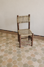 Palm Leaf Wooden Chair handcrafted from solid wood with a natural handwoven palm leaf seat