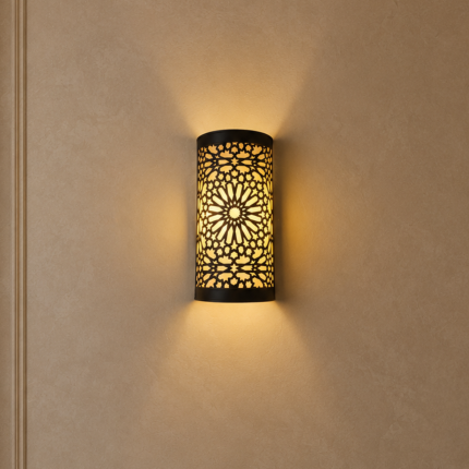 Handmade Moroccan rosette brass wall sconce with pierced floral pattern and warm ambient lighting.