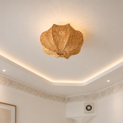 Sculptural petal raffia ceiling light with handwoven natural fibers, metal frame and organic flower-shaped flush mount design.