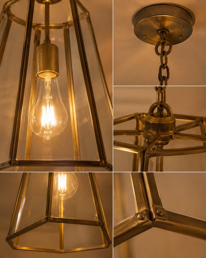 Handmade trapezoid glass pendant light with clear panels and geometric metal frame hanging from ceiling.