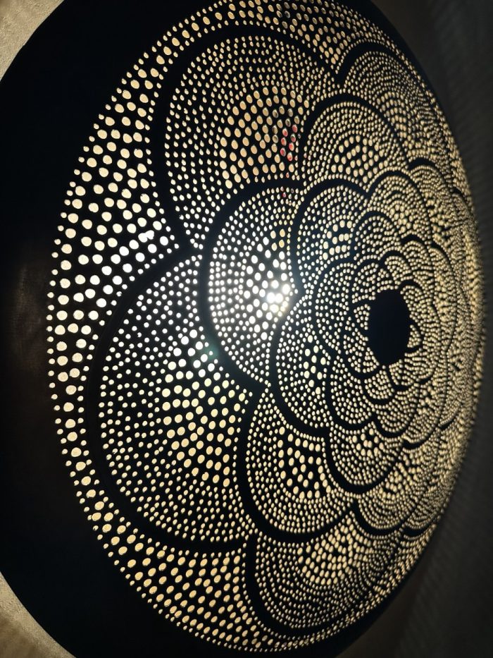 Moroccan Brass Flower Wall Light with handmade pierced rosette pattern and warm decorative glow