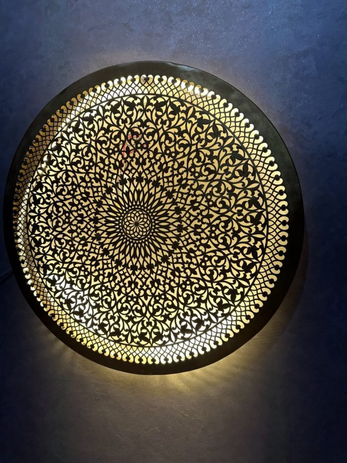 Ornate Brass Medallion Wall Light handcrafted from solid brass with intricate pierced floral detailing