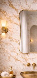 Handmade wavy rectangle brass wall mirror with organic curved edges and solid brass frame above bathroom vanity.