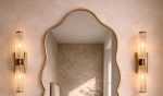 Wavy Brass Bathroom Mirror with handmade brass frame above bathroom vanity