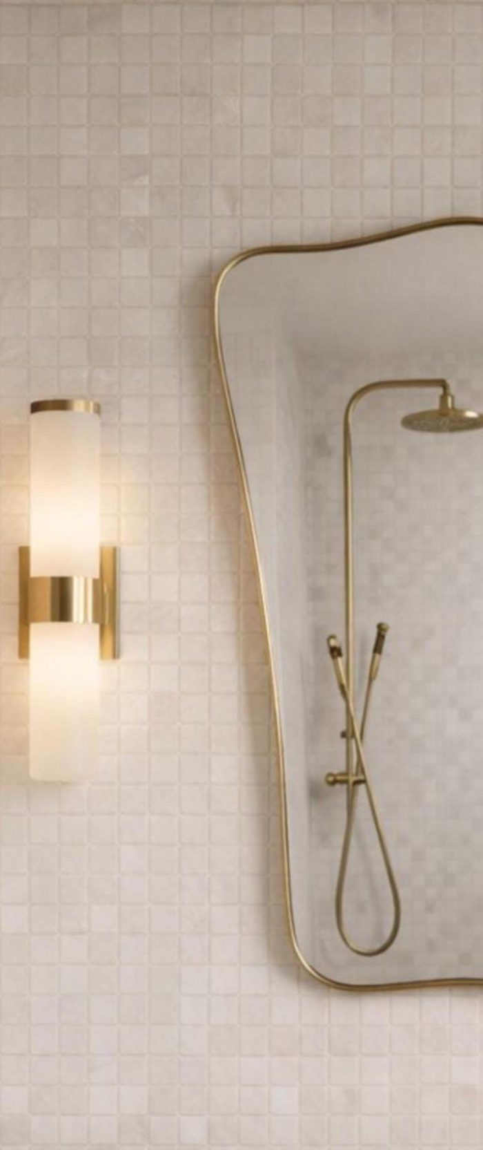 Curved Rectangle Brass Mirror with handcrafted slim brass frame in a modern bathroom vanity setting