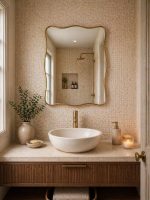 Handmade Wavy Brass Bathroom Mirror with curved edges in Moroccan bathroom interior