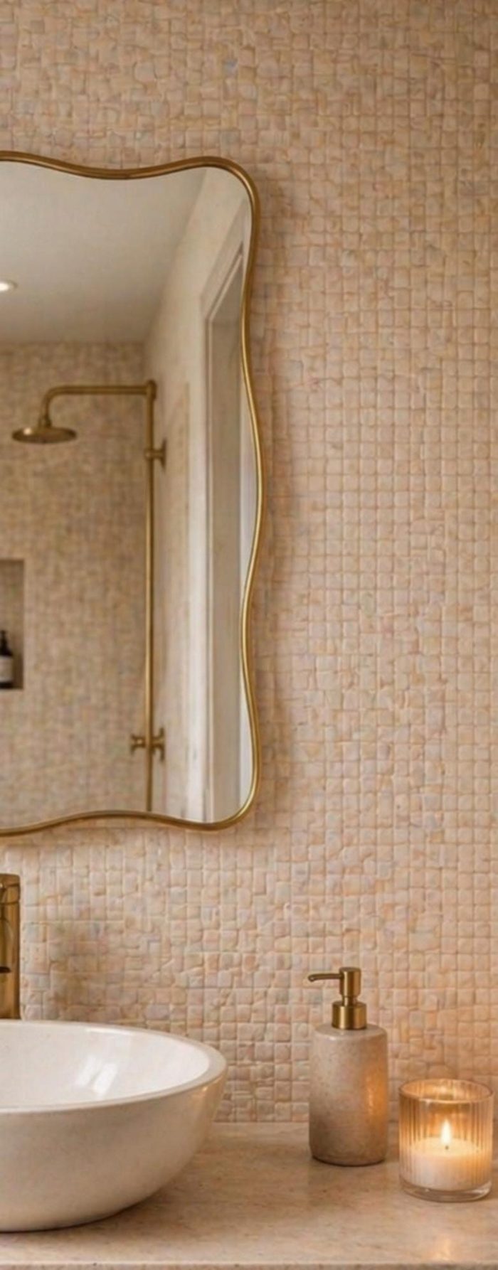 Handmade Wavy Brass Bathroom Mirror with curved edges in Moroccan bathroom interior