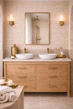 Handmade rectangular brass wall mirror with slim solid brass frame displayed above a double bathroom vanity.