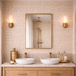 Handmade rectangular brass wall mirror with slim solid brass frame displayed above a double bathroom vanity.