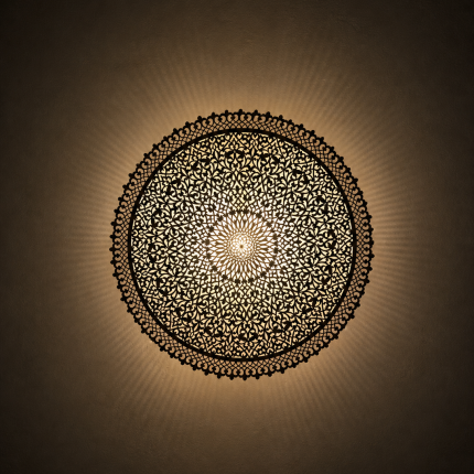 Round Filigree Brass Wall Light with intricate hand-perforated brass design